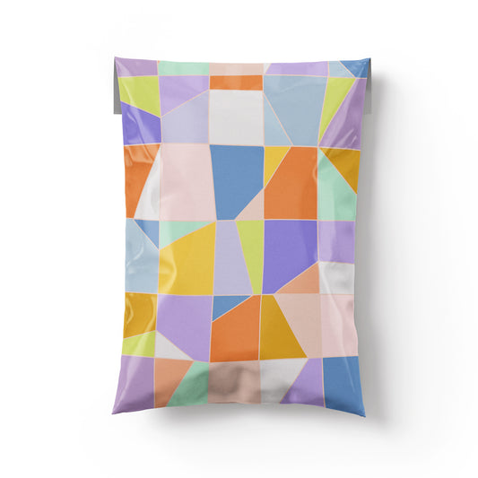 Colorful geometric-patterned poly mailer for online order shipping on a white background
