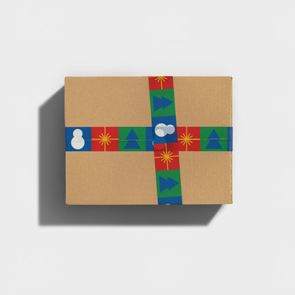 Gift-wrapped box and Christmas tree designs on sticky tape securing a parcel.